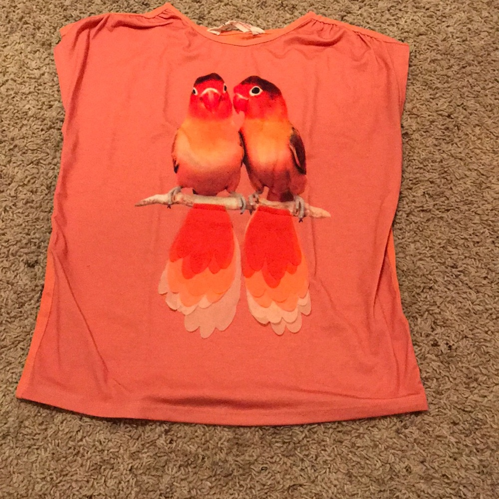 Girls pink parrot shirt with tassel things